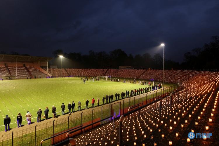 抗议卡塔尔世界杯，艺术家在德国用20000根蜡烛哀悼死去的工人