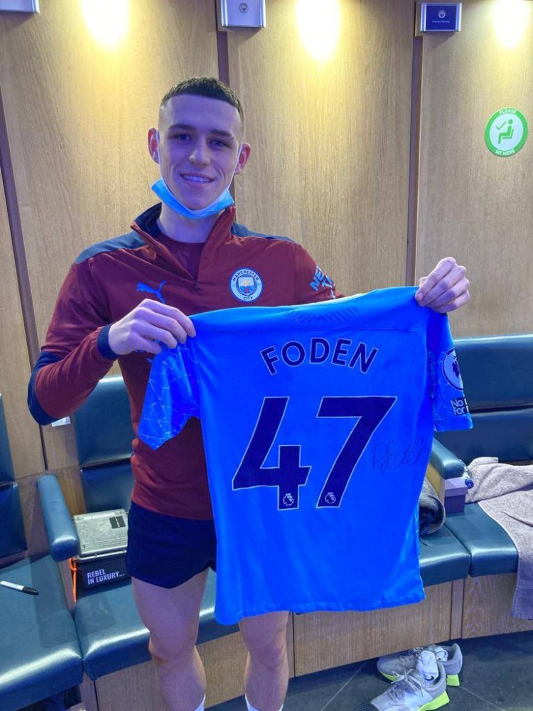 助力慈善京多安拍卖福登对阵利物浦签名球衣